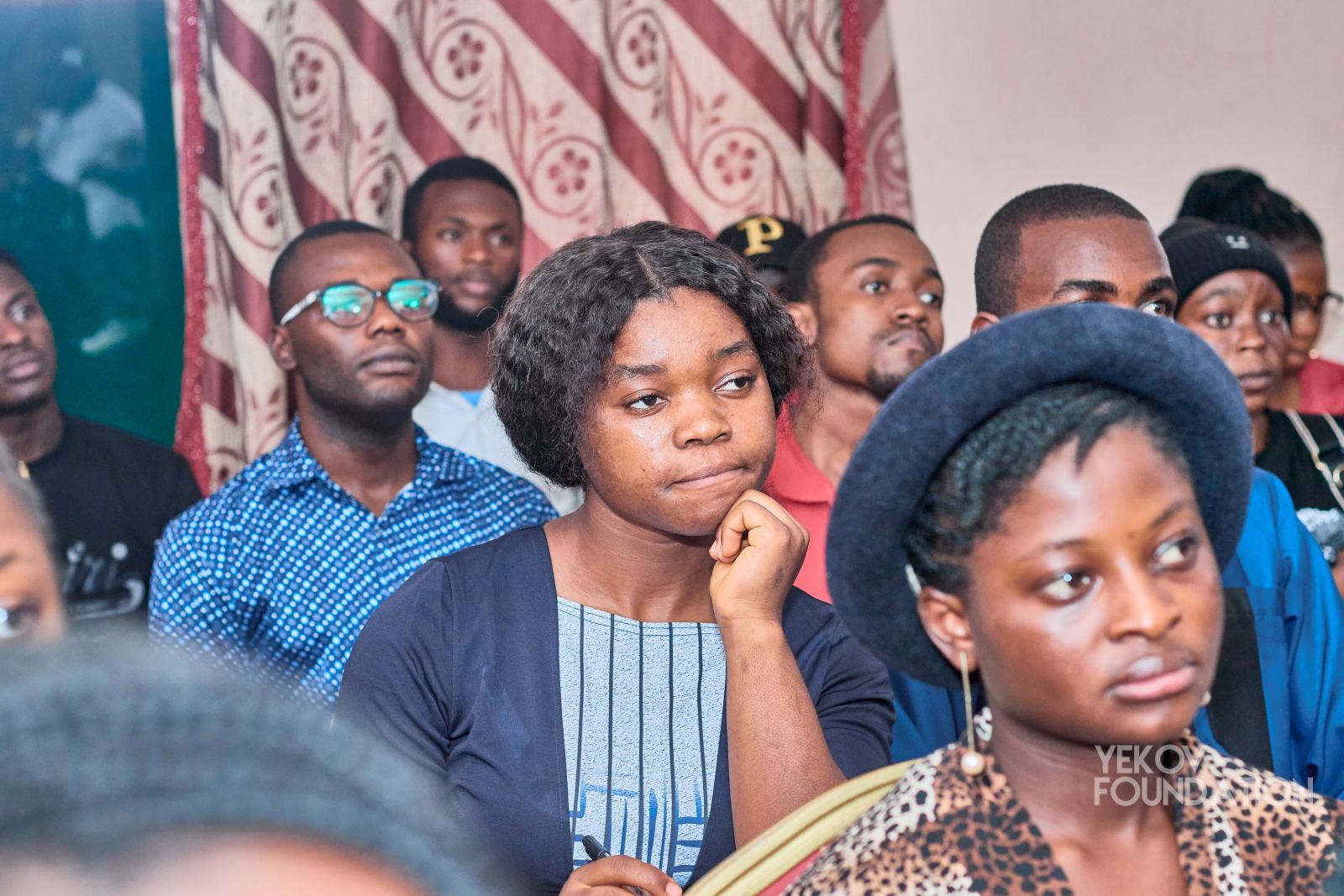 Young people listening during a Yekov Foundation session