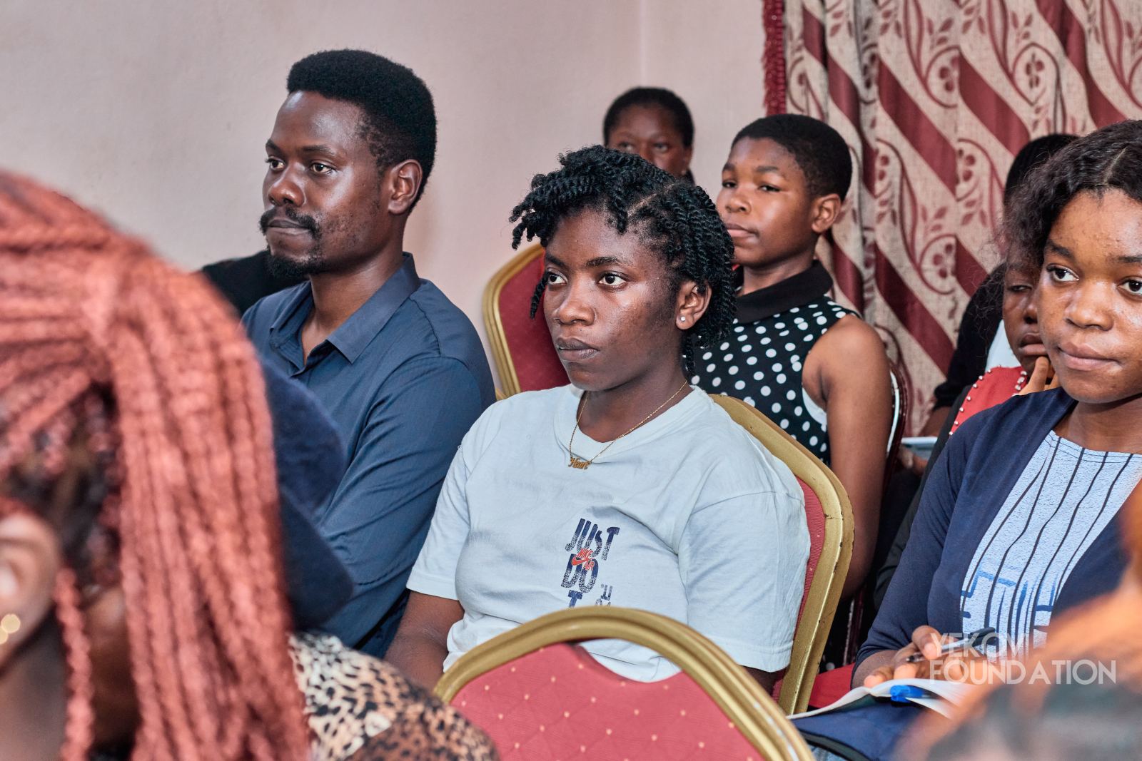 Young people listening and reflecting during a session