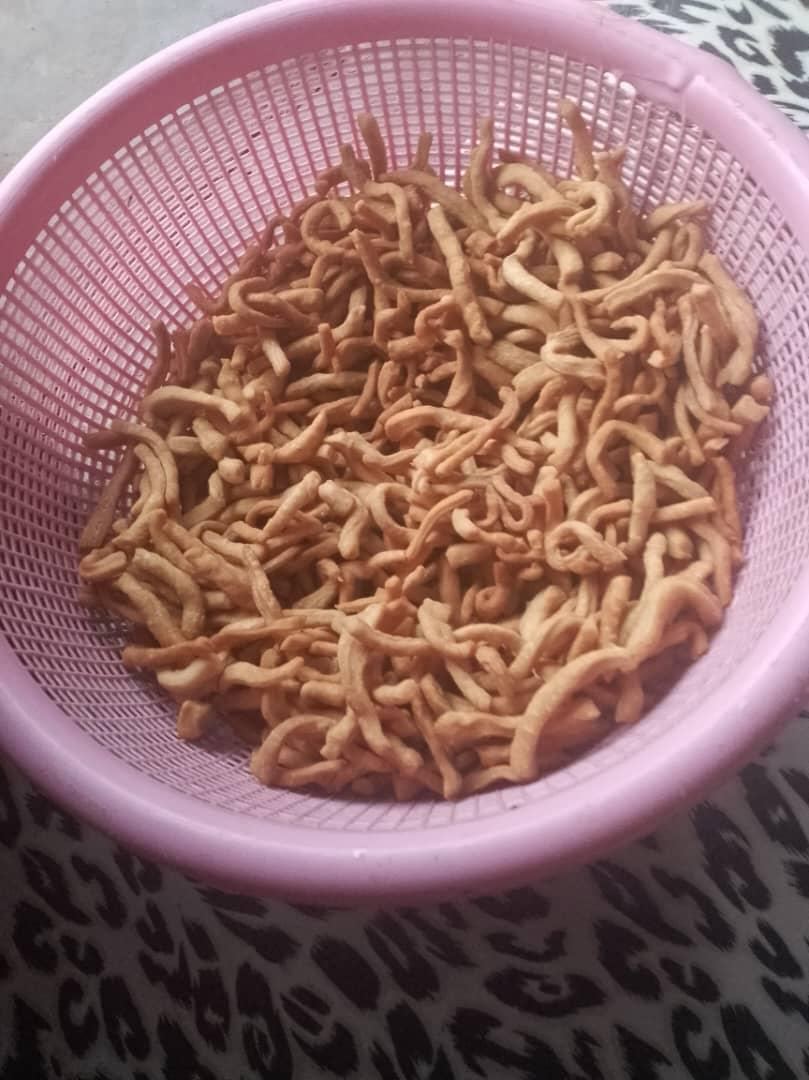 A basket of crunchy chin chin made by a student at home