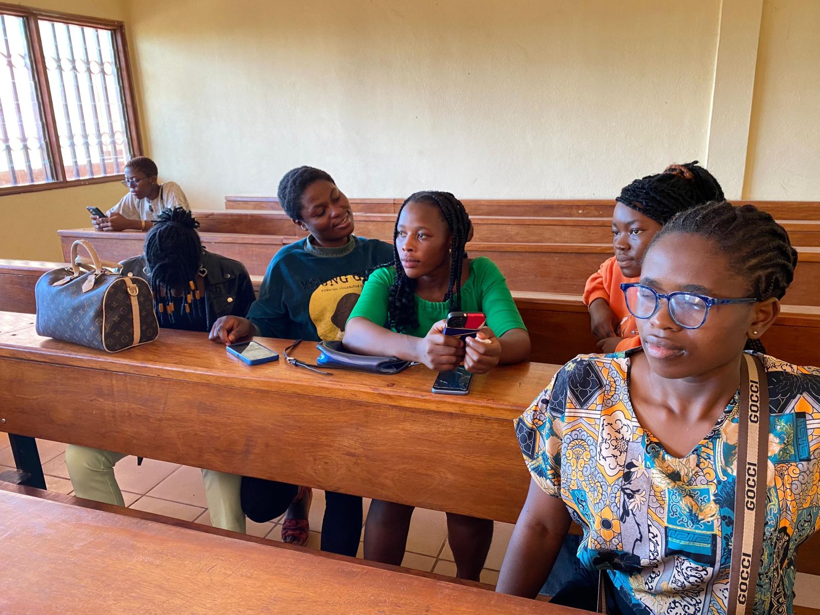Students seated in a classroom listening